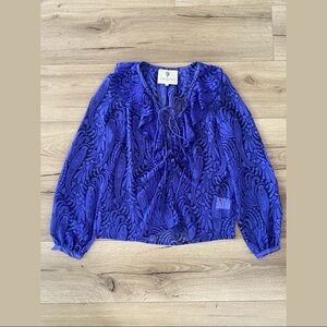 the jetset diaries printed long sleeve sheer lace up ruffle blouse